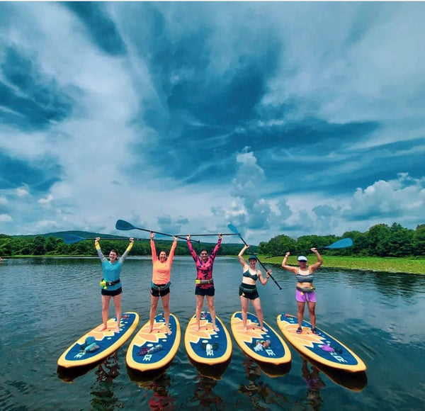 women on paddleboards
