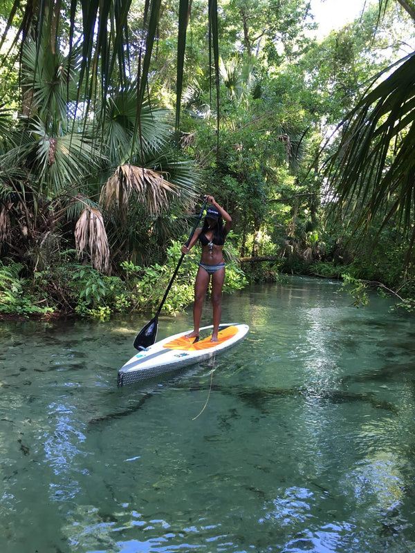 woman on a hard paddle board