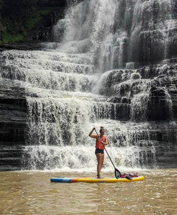woman on inflatable paddle board