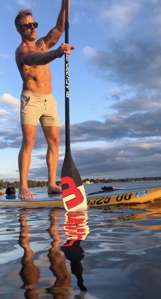 man on paddle board