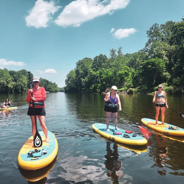 women on paddleboards