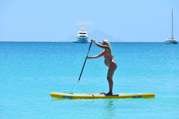 pregnant paddle boarder