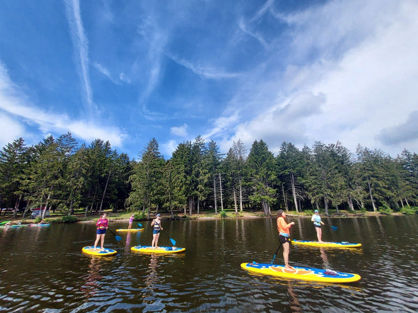group on paddle boards