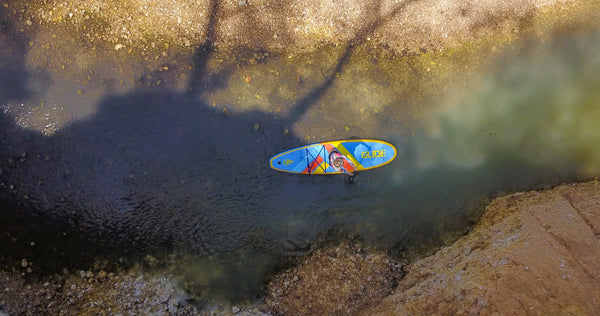 paddle board in distance